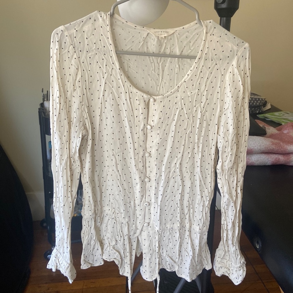 White blouse black polka dots